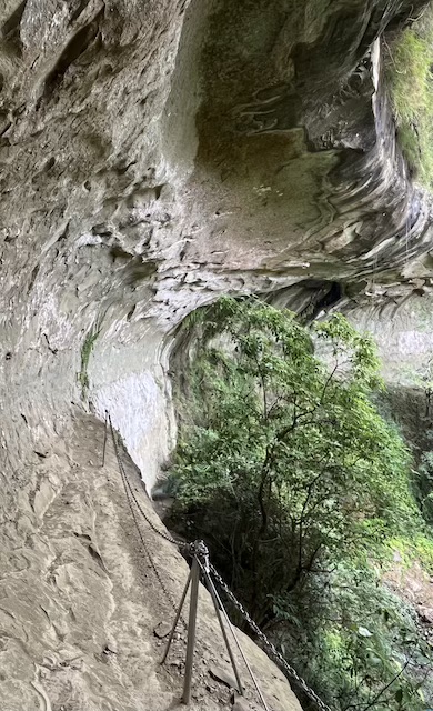 side view of Pipa Cave Waterfall
