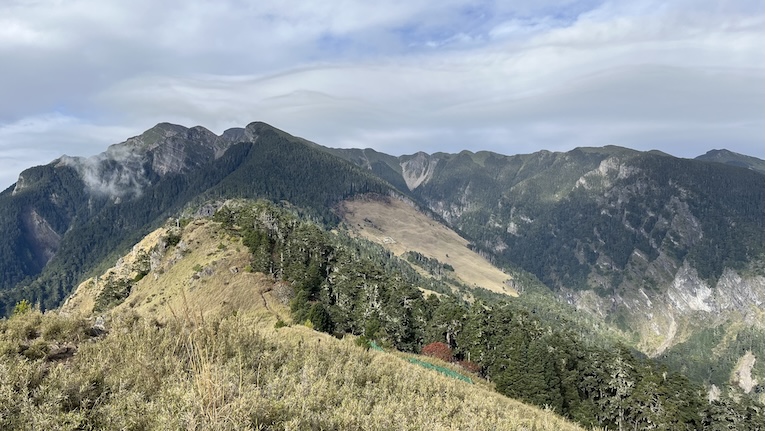 The Ultimate Xueshan (Snow Mountain) Hiking Guide: Permits, Transport & 1–3 Day Itineraries (2026 Edition) 52 view from Xueshan East Peak