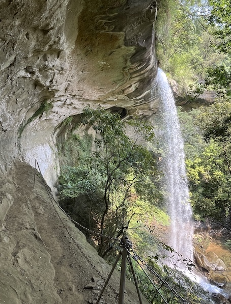 Side view of Pipa Cave Waterfall